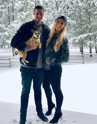 Tomi Lahren having fun with her partner during vacation. Know more about Tomi earnings, total assets, wages, remuneration, wealth and other valuable belongings.